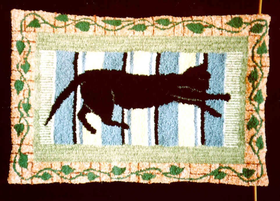 Summer cat on mat